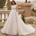 فستان زفاف مودست Modest Wedding Dress بأكمام طويلة وياقة O-Neck مع Lace Appliques بطول الأرض