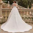 فستان زفاف مودست Modest Wedding Dress بأكمام طويلة وياقة O-Neck مع Lace Appliques بطول الأرض