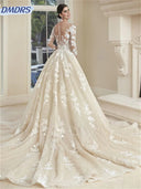 Elegant Tulle Wedding Dress فستان زفاف أنيق بتول مع Appliques وأكمام طويلة بتصميم فاخر