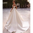 Exquisite Satin Wedding Dress فستان زفاف ساتان فاخر بدون أكمام Strapless بتصميم Ball Gown مع Beading