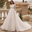 فستان زفاف مودست Modest Wedding Dress بأكمام طويلة وياقة O-Neck مع Lace Appliques بطول الأرض